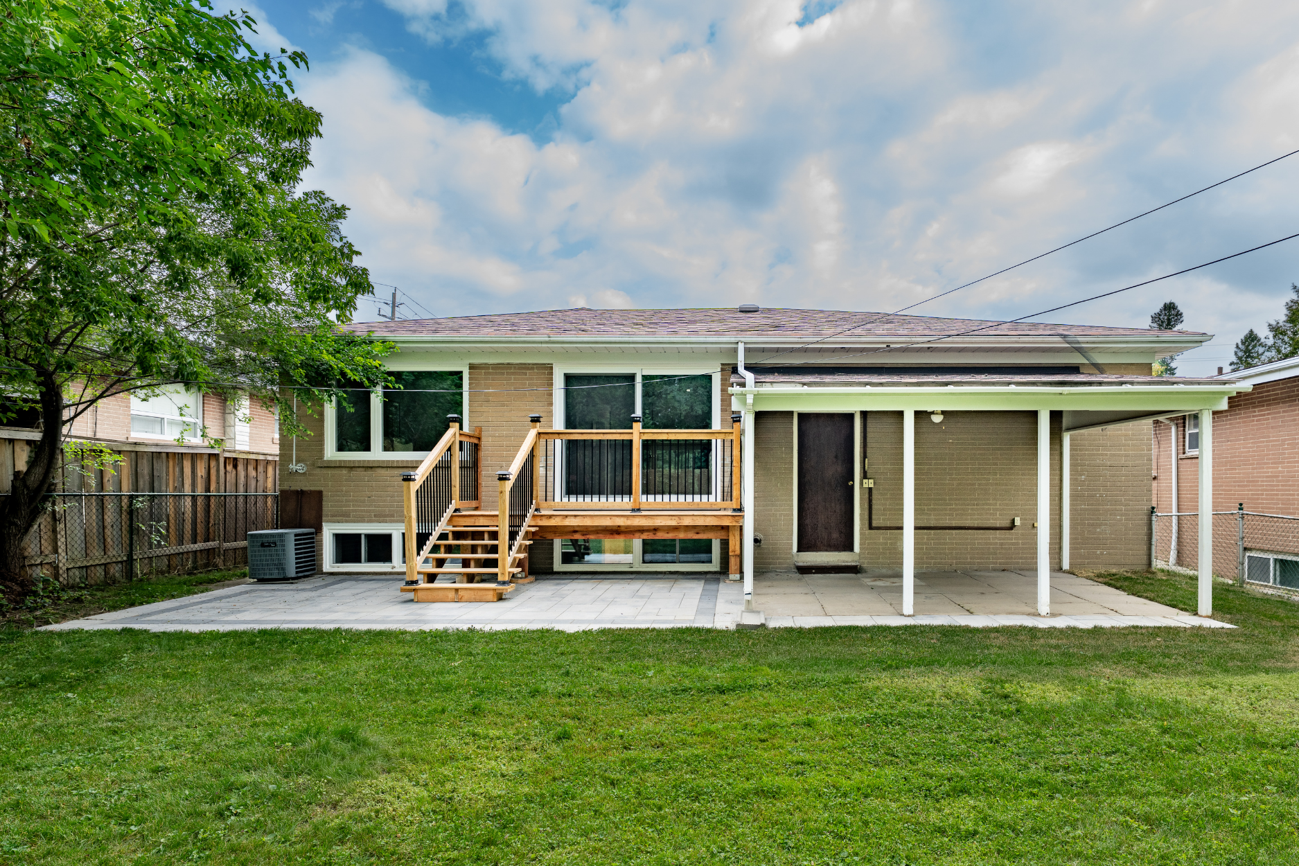 Exterior architecture beneath a clear Bayview Village sky