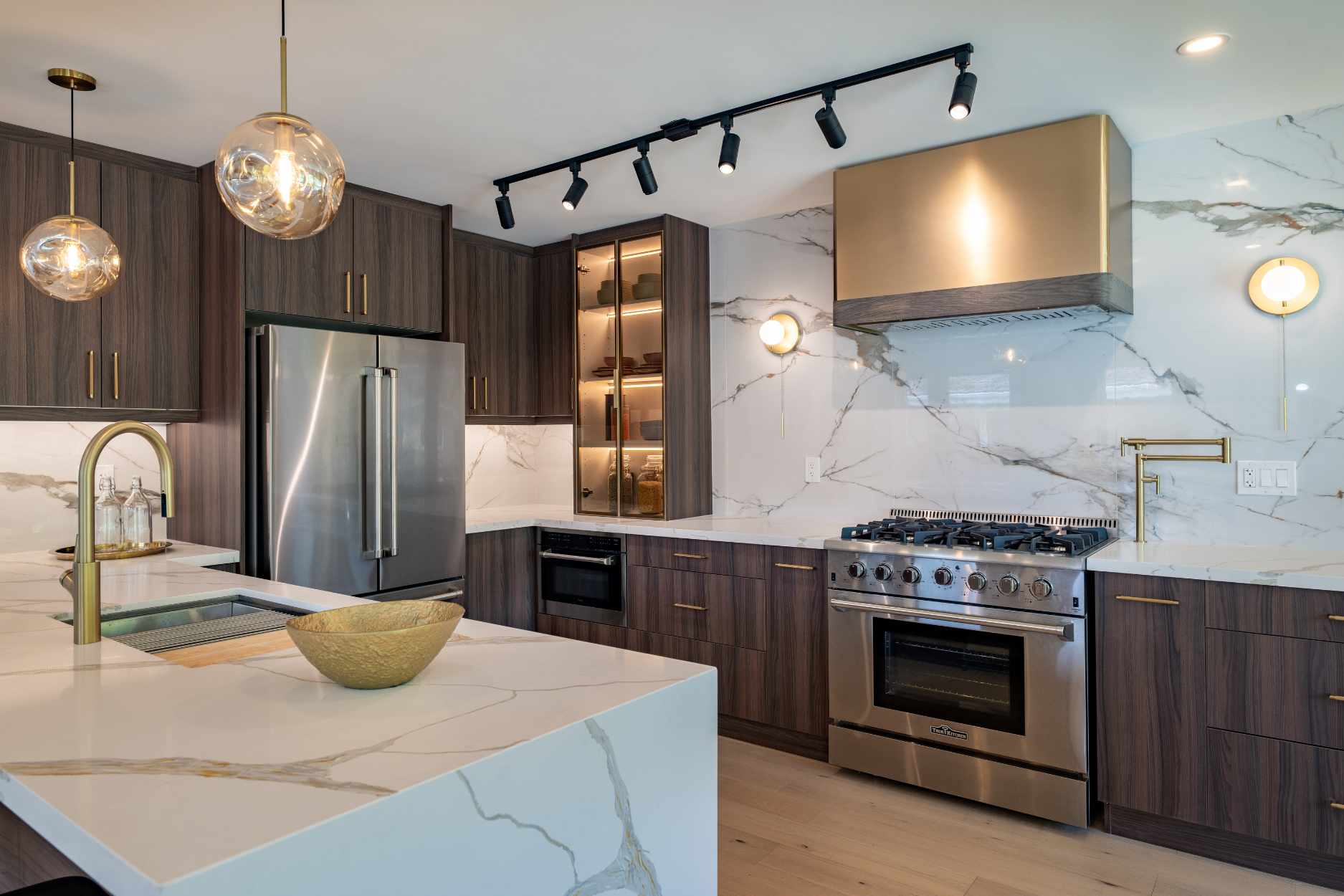 Contemporary interior with a sleek marble surface and chandelier